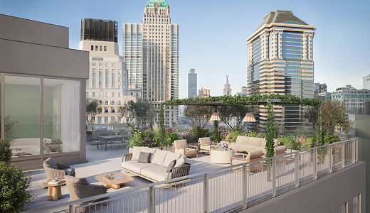 exterior view of rooftop patio area at luxury apartment building with sofas, chairs and a pergola
